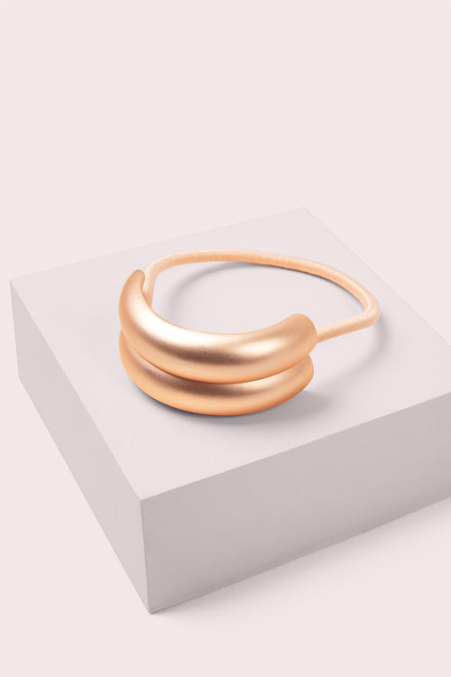 The Hair Edit Brilliant Double Cuff on pink box