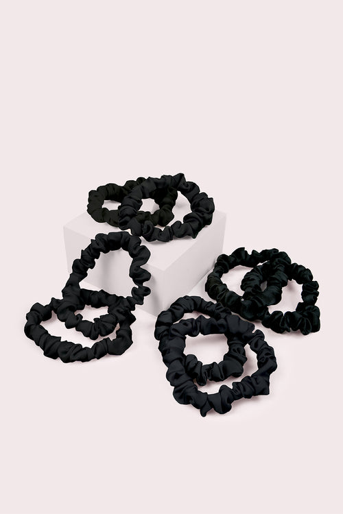 The Hair Edit Black Ruched Ribbon Scrunchies on pink box