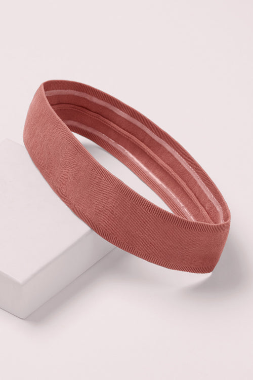 Harmony Band Ribbed Headband on a pink box