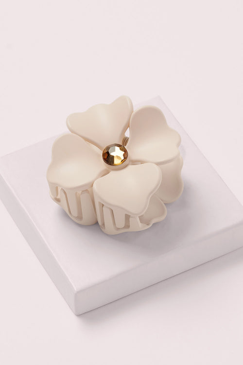 Camellia Rhinestone Flower Claw Clip on a pink box