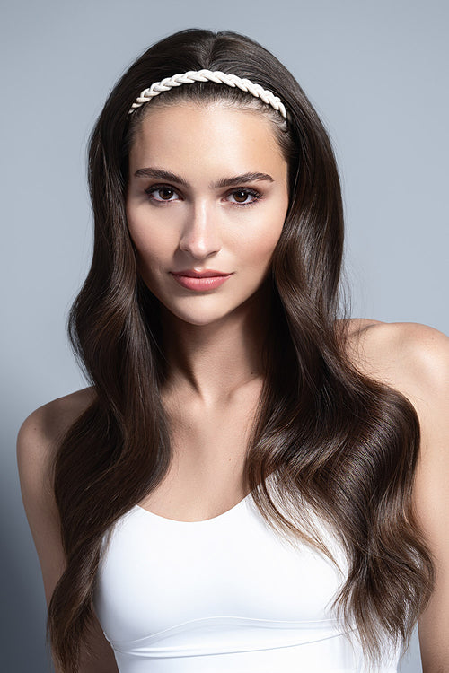 model wearing Salutation Slim Braided Headbands in her hair