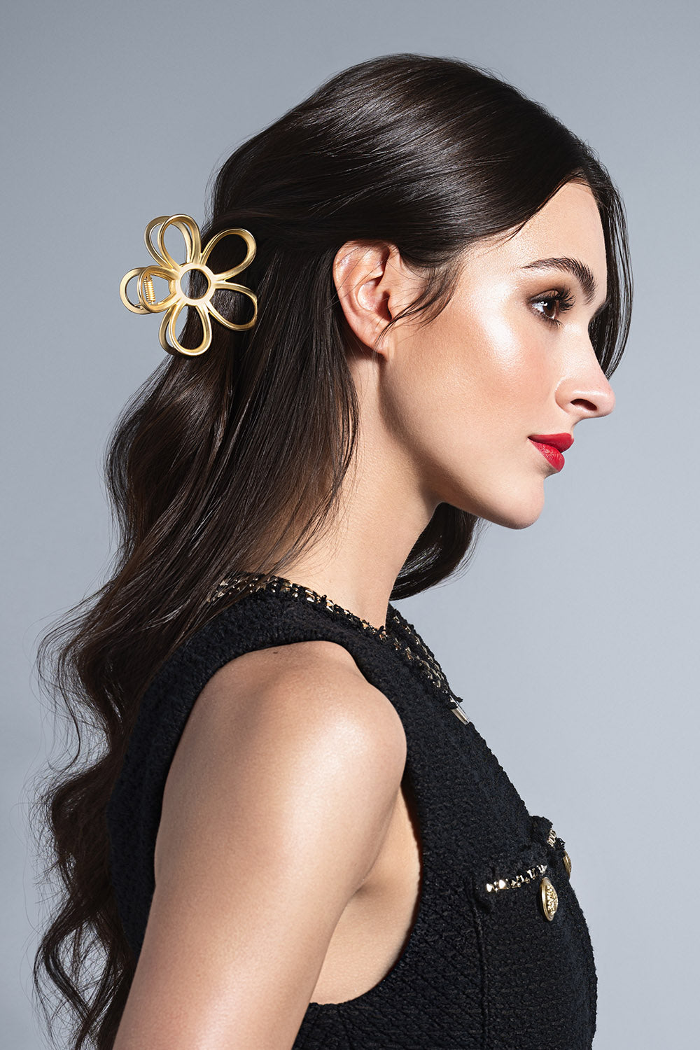 model with Gilded Secret Garden Flower Claw Clip in her hair