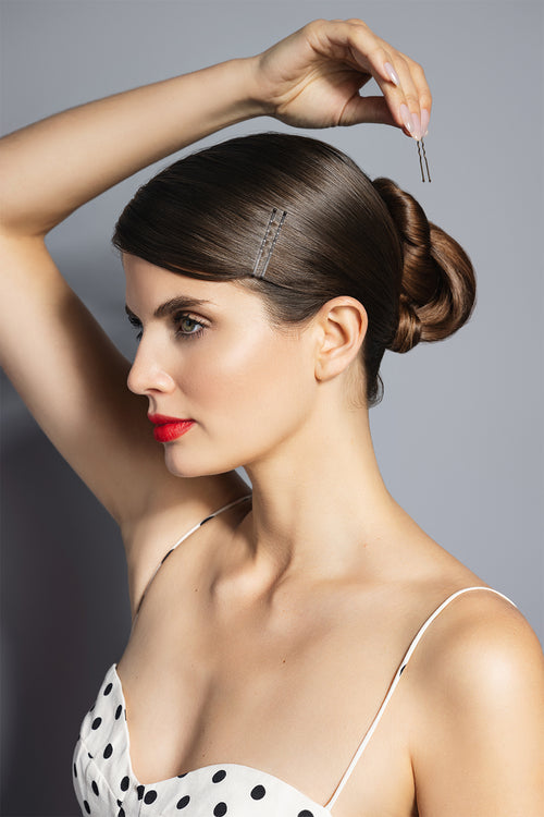 brown u-shaped bobby pins in models hair