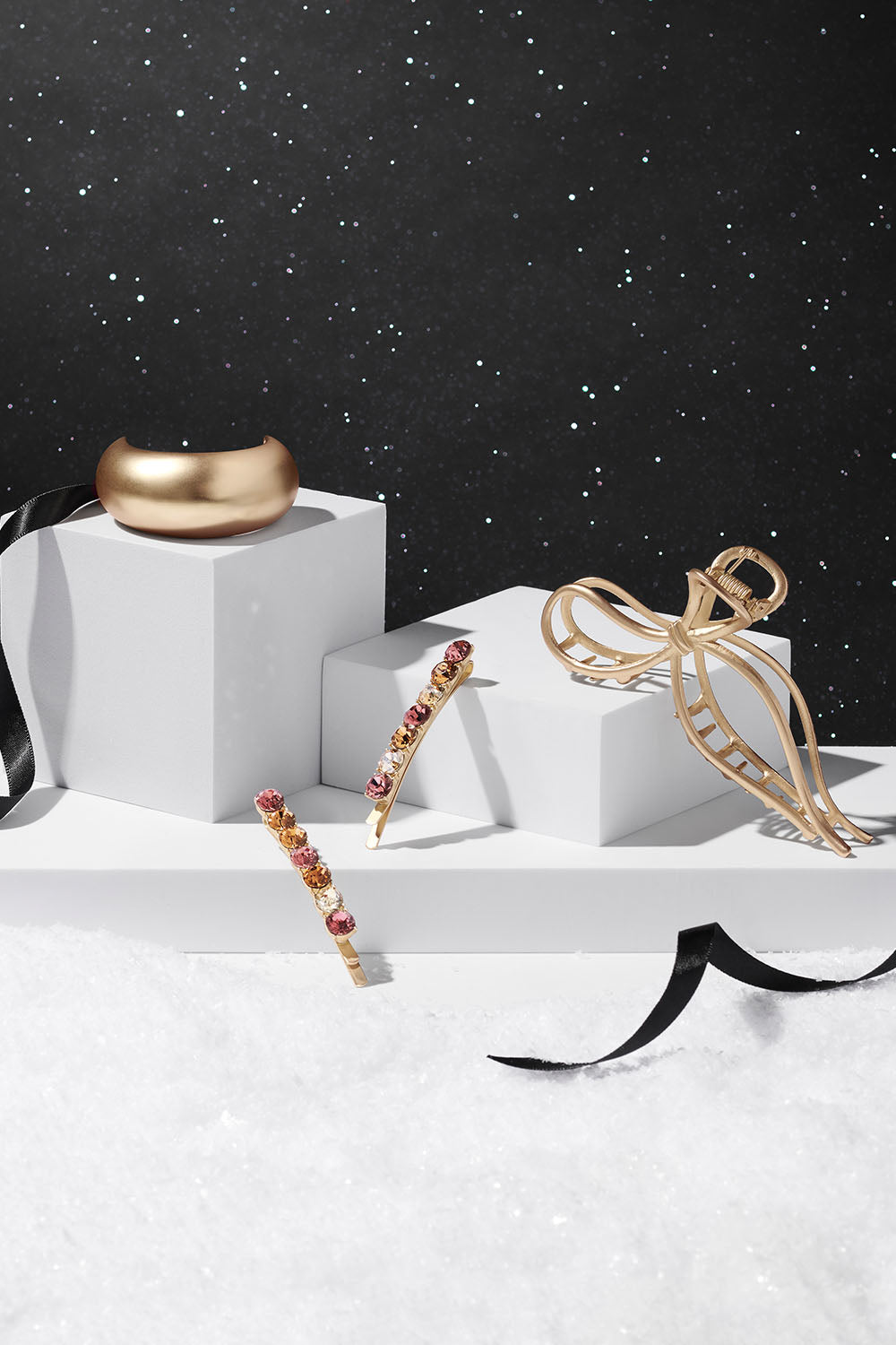 the hair edit holiday bundle with gilded bow claw clip brilliant cuff hair tie and glow on and sparkle bobby pins