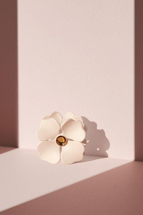 Camellia Rhinestone Flower Claw Clip on a pink runway