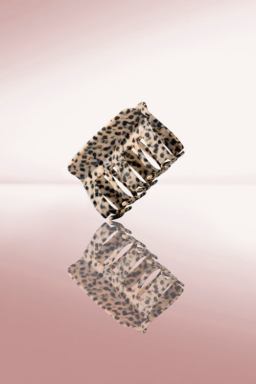 the hair edit wild cheetah claw clip lifestyle reflection