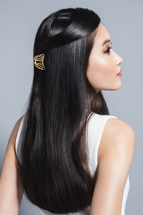 model with Petite Gilded Mermaid Claw Clips in her hair