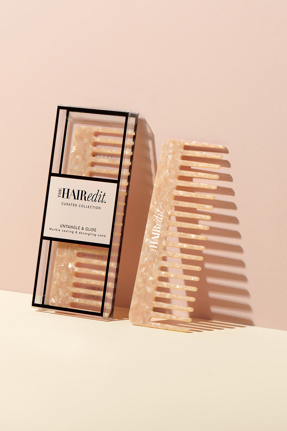the hair edit untangle and glide beige comb in and outside of packaging