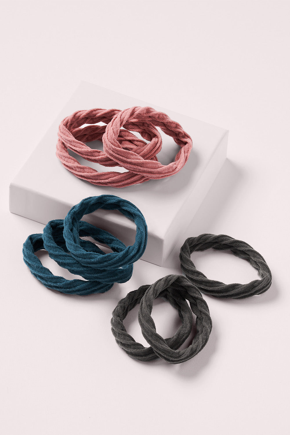 http://www.thehairedit.com/cdn/shop/products/the-hair-edit-S2312U-tortillon-bands-9-ct.jpg?v=1659475181