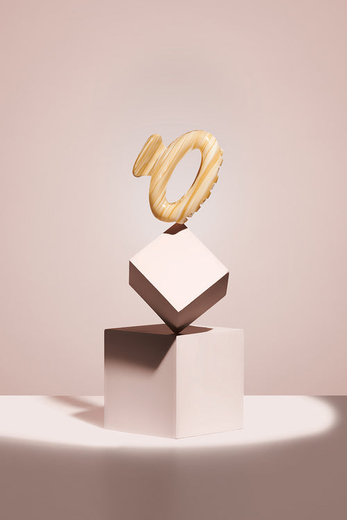 ellipse oval hair claw clip in caramel marble on cube