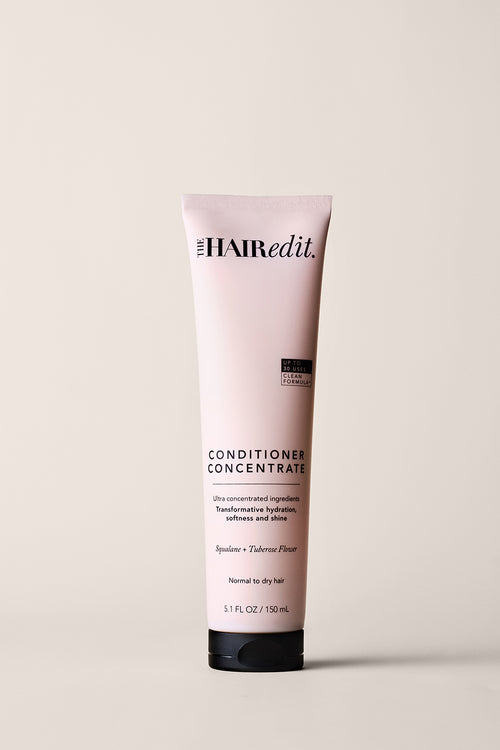 The Hair Edit Conditioner Concentrate Tube on a Beige Background 
