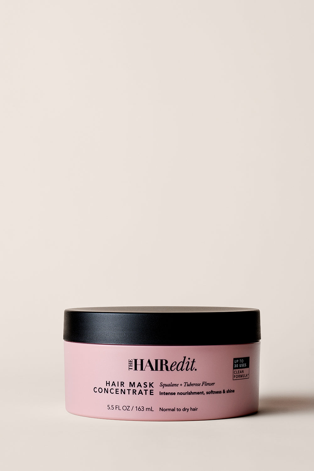 The Hair Edit Hair Mask Concentrate Jar on a Beige Background 1