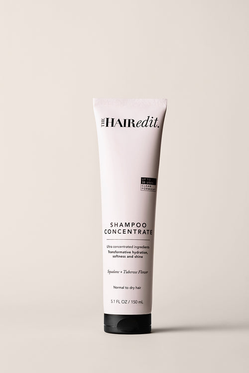 The Hair Edit Shampoo Concentrate Tube on a Beige Background 