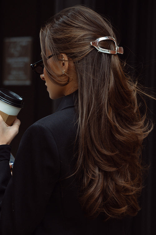 Danielle Bernstein wearing The Hair Edit’s Silver Flat Lay Claw Clip in her hair  