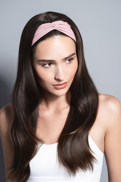 model wearing Lotus Soft Pleated Headband in her hair 