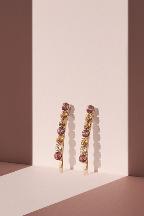 Glow On & Sparkle Gemstone Bobby Pins on a pink runway