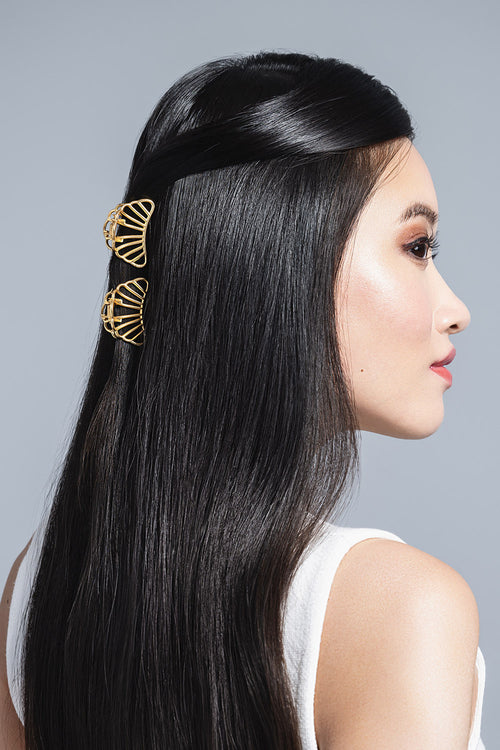model with Petite Gilded Mermaid Claw Clips in her hair 