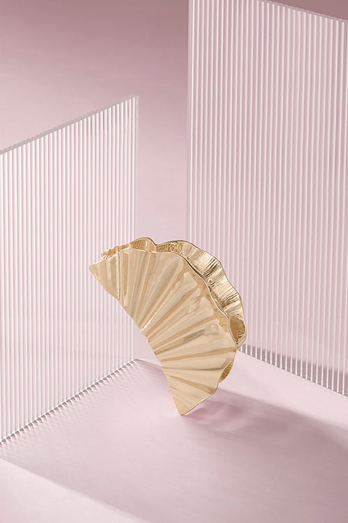 The Hair Edit Golden Hour Claw Clip on a pink background