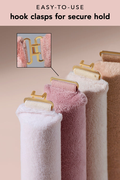 Set of four hair rods with gold clasp hooks on a beige background, featuring text about easy-to-use hook clasps.