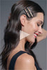 A video of a brunette model with Glow On & Sparkle Gemstone Bobby Pins in her hair 