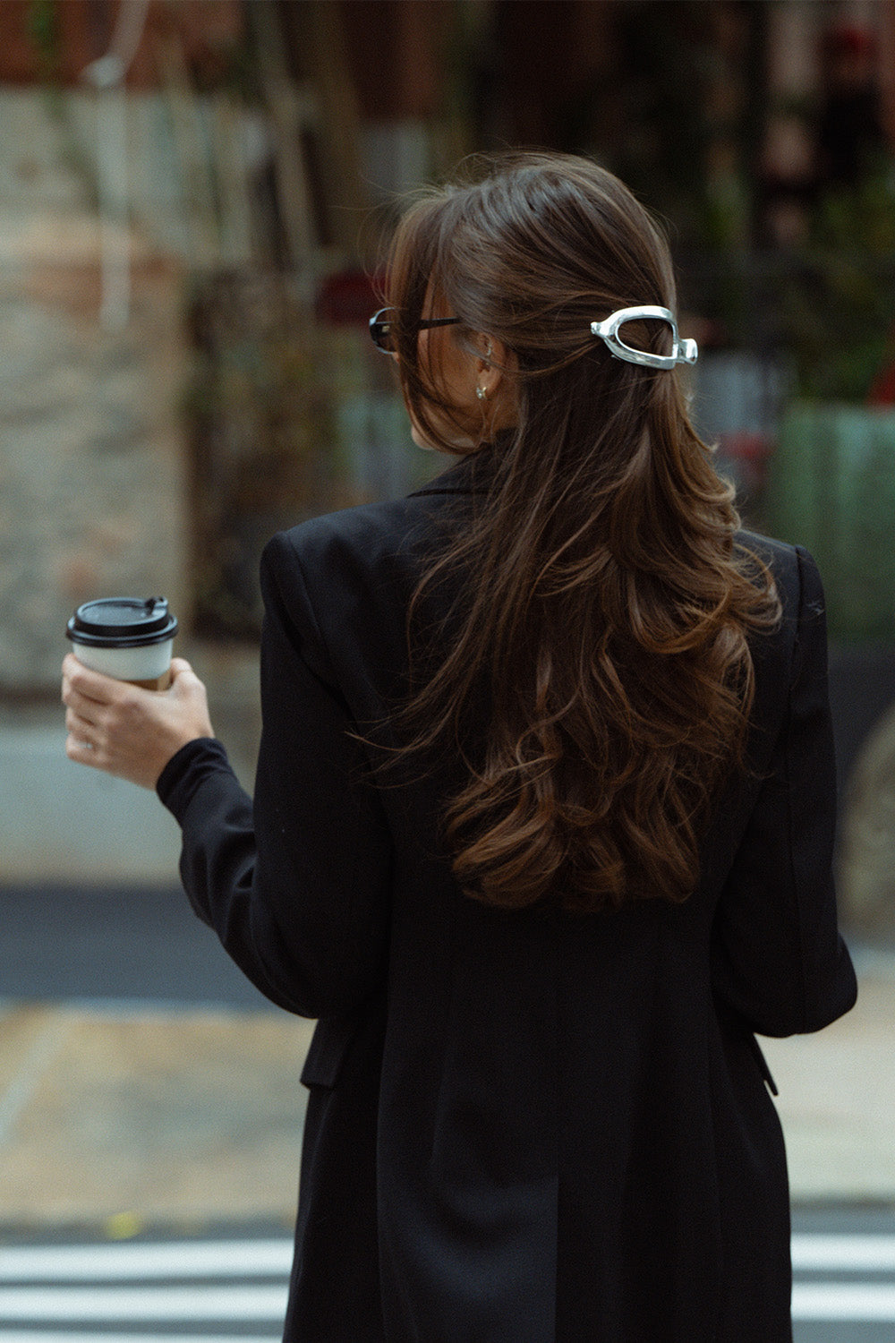 Danielle Bernstein wearing The Hair Edit’s Silver Flat Lay Claw Clip in her hair 4