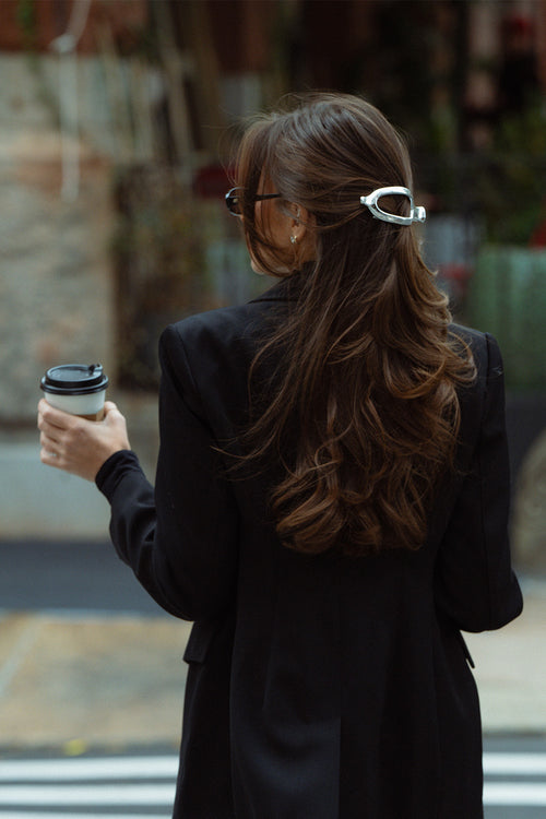 Danielle Bernstein wearing The Hair Edit’s Silver Flat Lay Claw Clip in her hair 